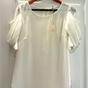 J Haun ivory/ white blouse w gold buttons on back and on puffy sleeve